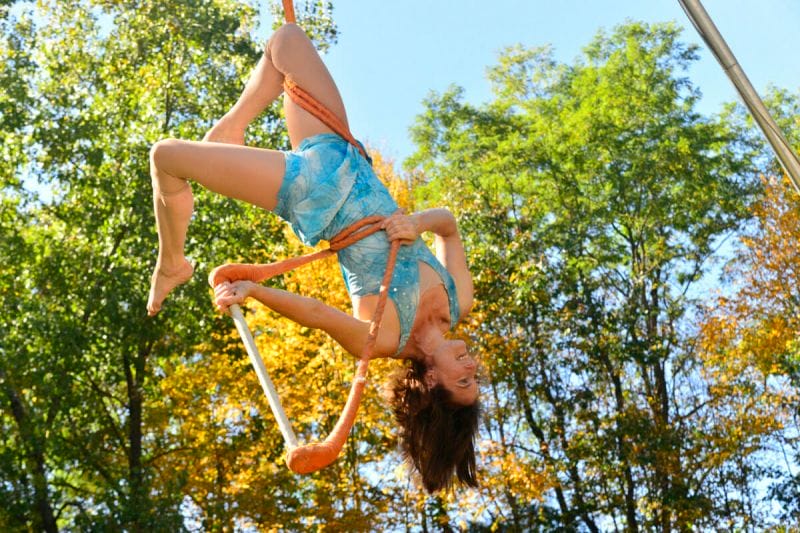 Nimble Arts performer on a trapese